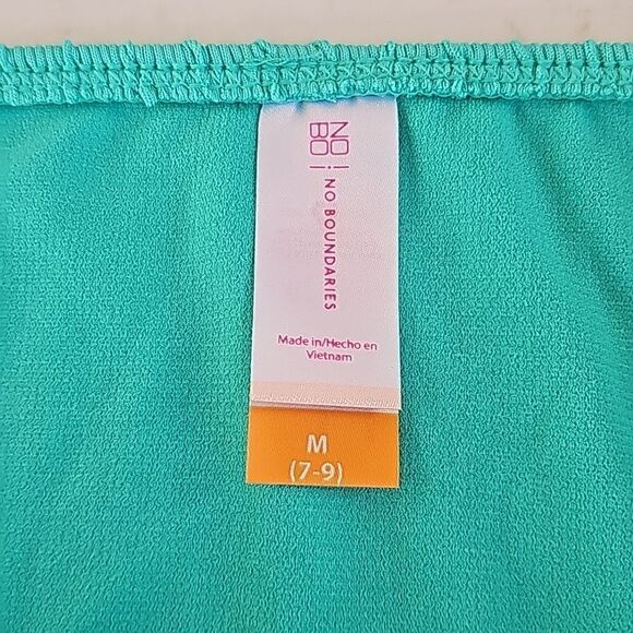 Green bikini features hardware on top and bottom size med (7-9) - Picture 4 of 10